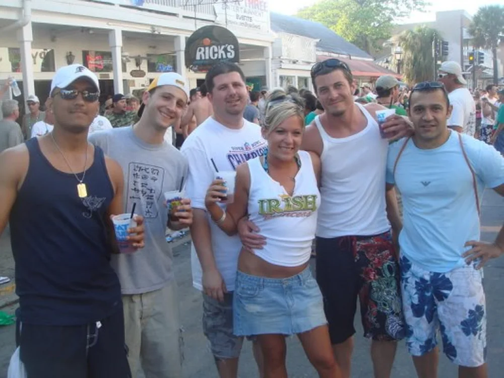 Group of friends enjoying spring break on Duval Street in Key West